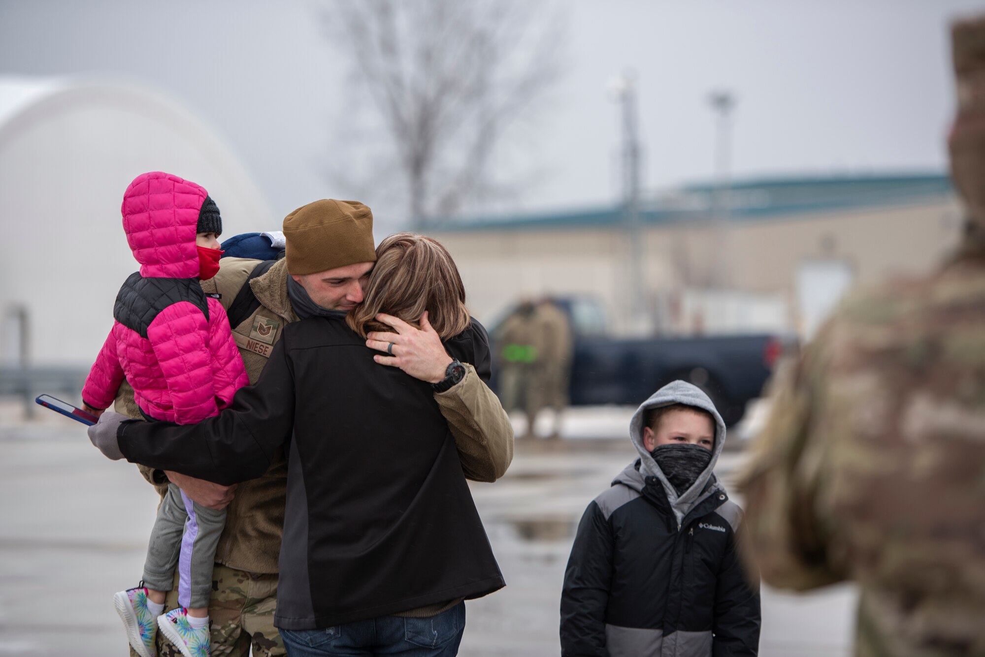 A U.S. Airman, assigned to the Ohio National Guard’s 180th Fighter Wing, embraces a loved one after returning home from an overseas deployment, Jan. 26, 2020 at the 180FW in Swanton, Ohio.