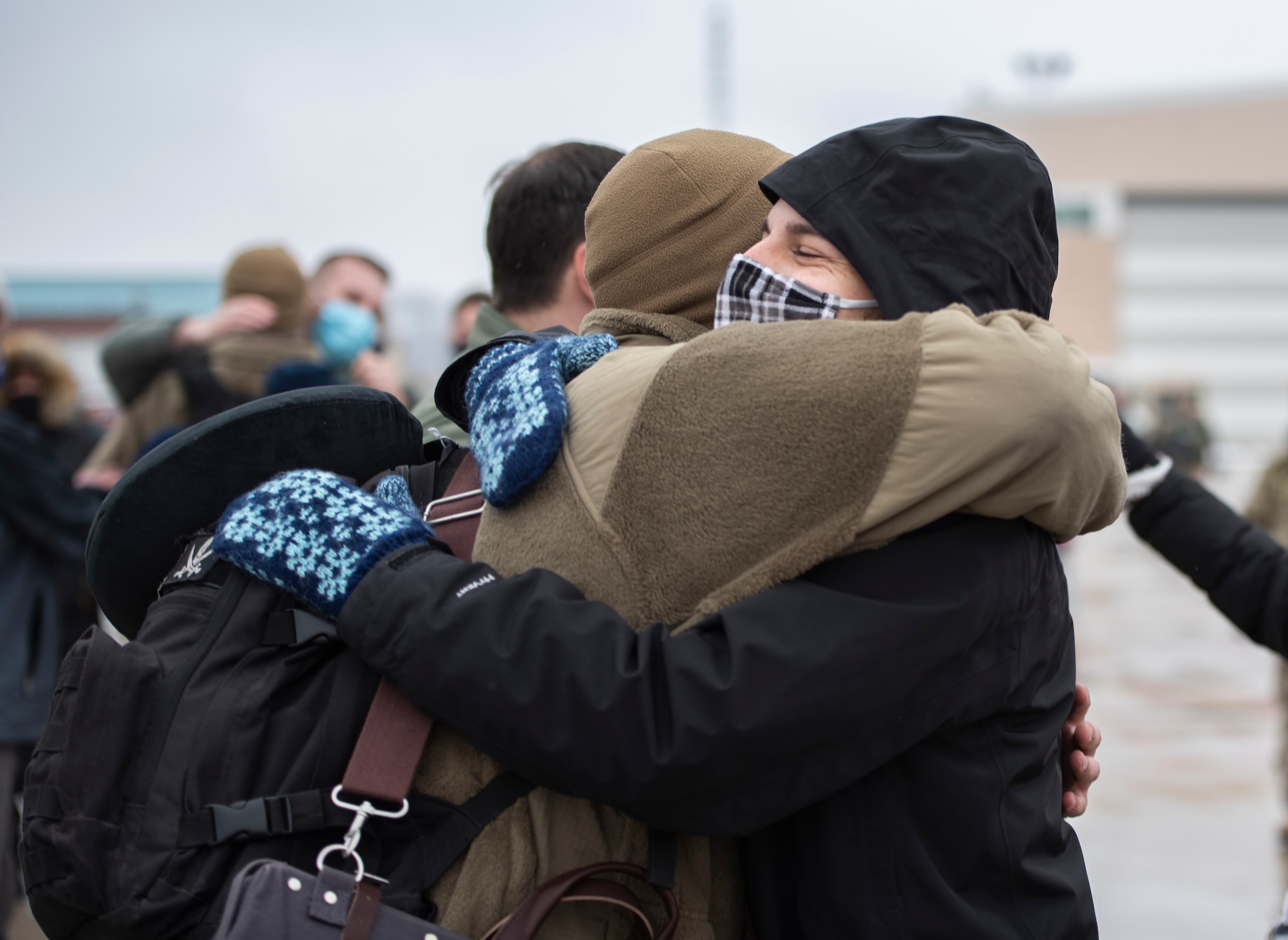 A U.S. Airman, assigned to the Ohio National Guard’s 180th Fighter Wing, embraces a loved one after returning home from an overseas deployment, Jan. 26, 2020 at the 180FW in Swanton, Ohio.