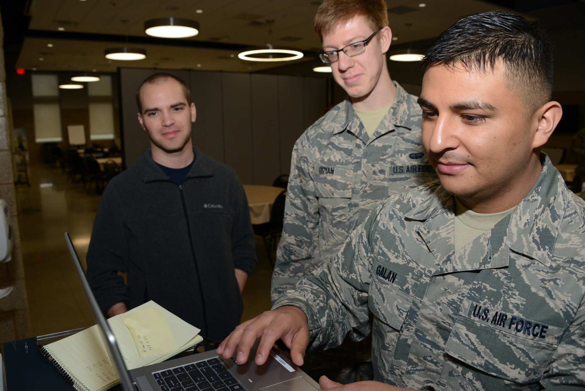 Air Refueling Wing Communications Flight, members from the Iowa Air National Guard work to set up printing capabilities at the Iowa National Guard’s “Joint Task Force West” operations center at the Iowa Air National Guard facility in Sioux City, Iowa.