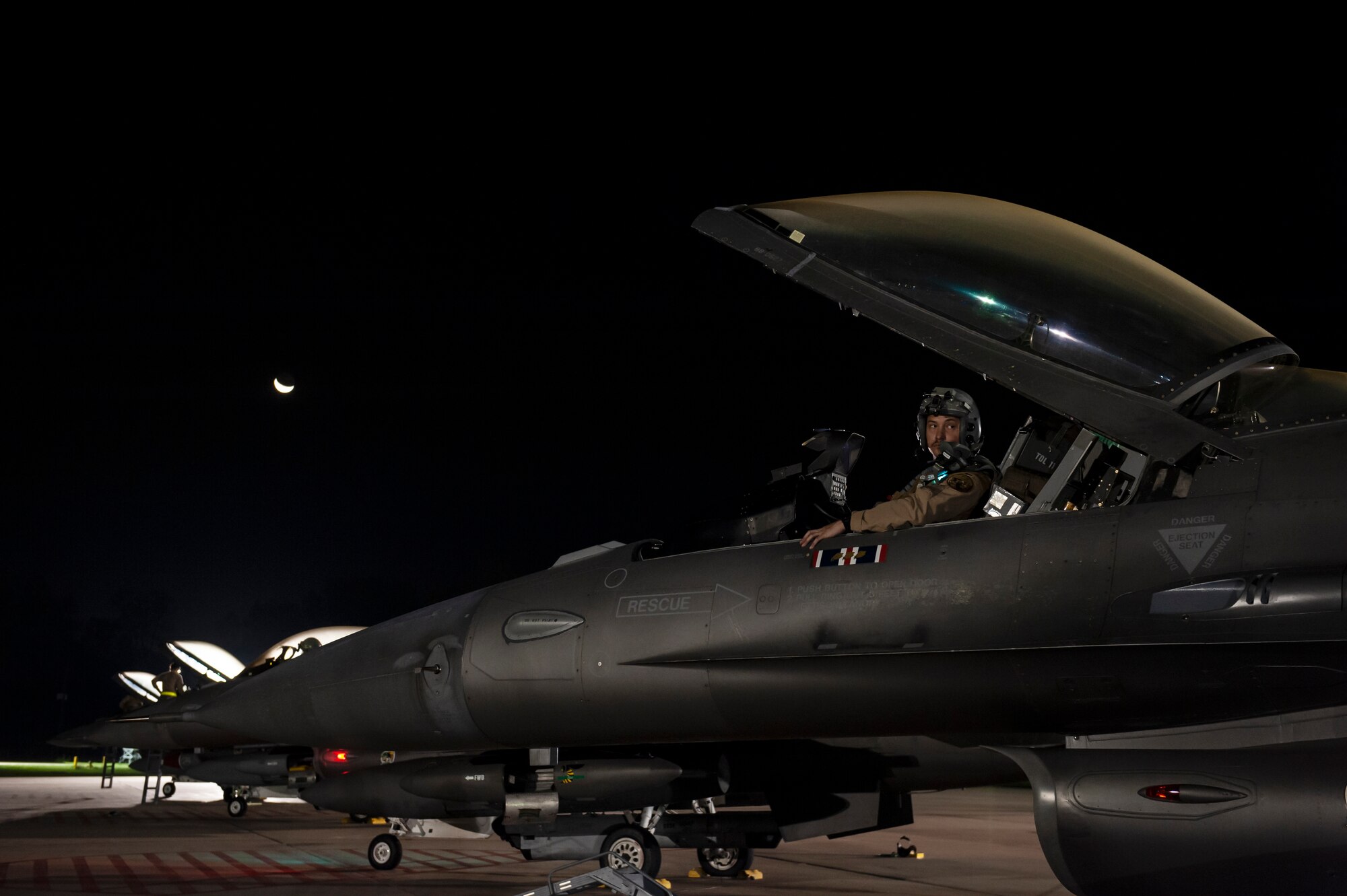 A U.S. Air Force F-16 Fighting Falcon pilot, assigned to the Ohio National Guard’s 180th Fighter Wing, prepares for an early morning take-off Oct. 12, 2020, departing from the 180FW in Swanton, Ohio, for an Aerospace Expeditionary Force deployment.