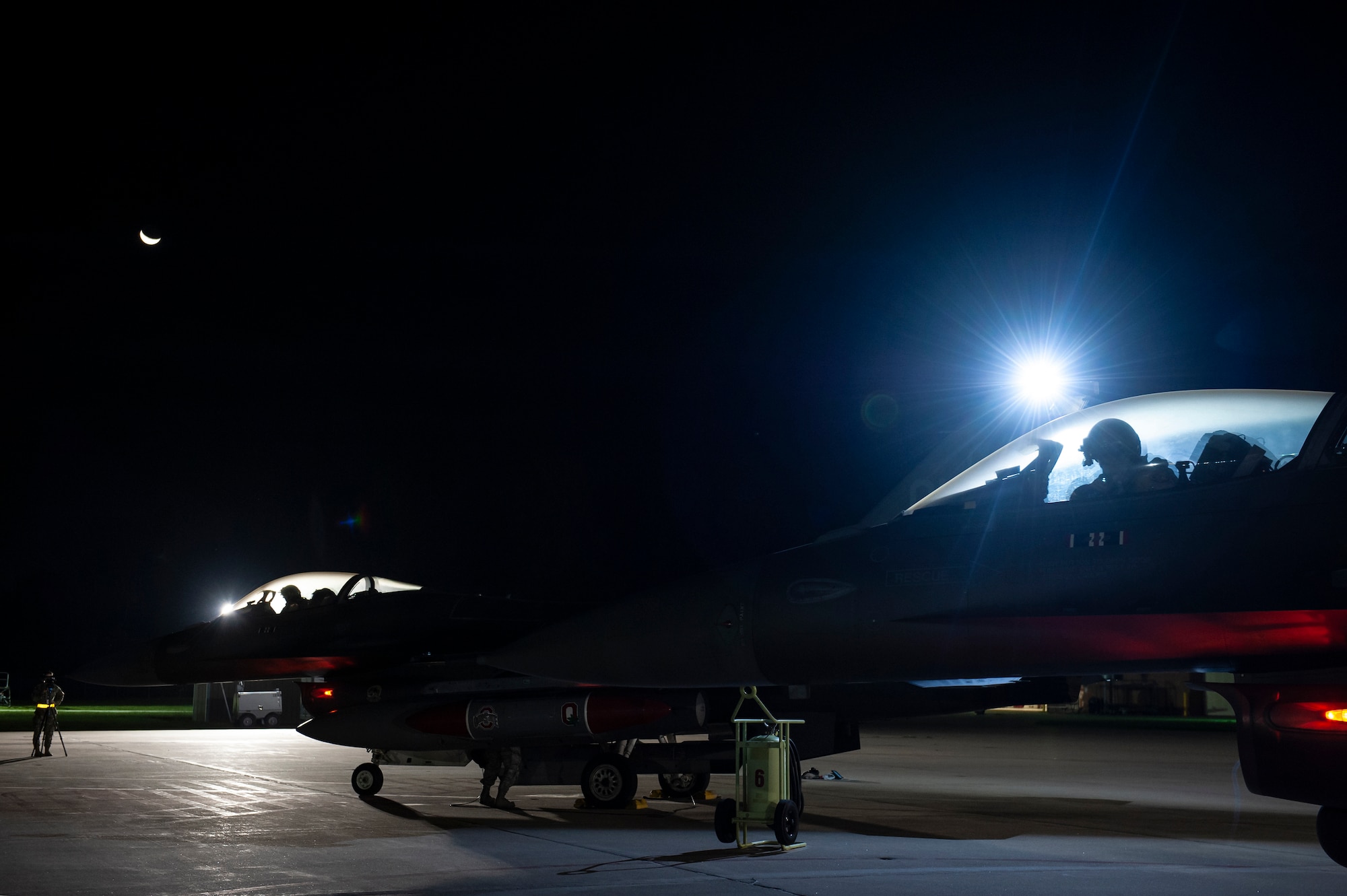 U.S. Air Force F-16 Fighting Falcon pilots, assigned to the Ohio National Guard’s 180th Fighter Wing, prepare for an early morning take-off Oct. 12, 2020, departing from the 180FW in Swanton, Ohio, for an Aerospace Expeditionary Force deployment.