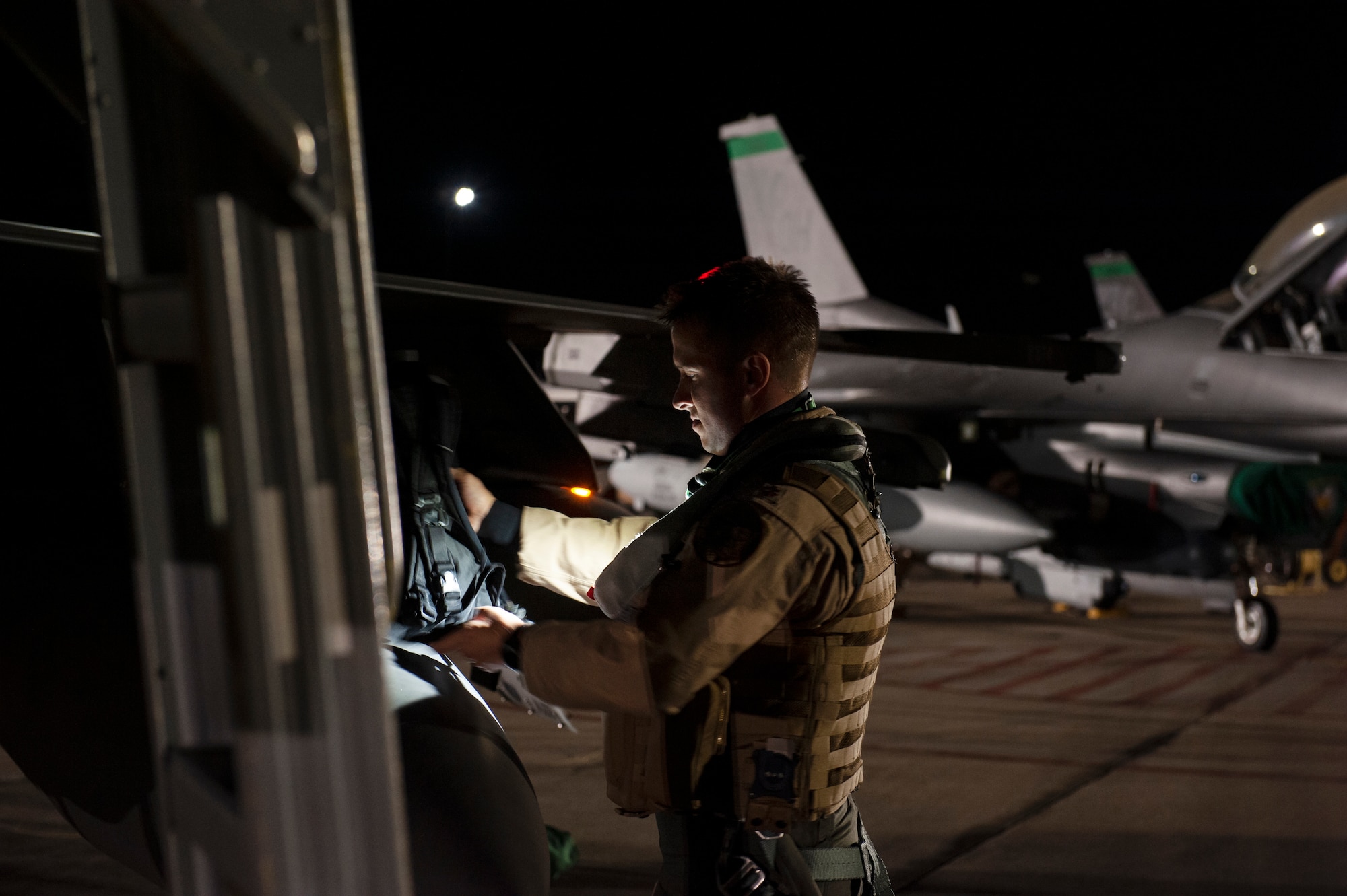 A U.S. Air Force F-16 Fighting Falcon pilot, assigned to the Ohio National Guard’s 180th Fighter Wing, prepares for an early morning take-off Oct. 12, 2020, departing from the 180FW in Swanton, Ohio, for an Aerospace Expeditionary Force deployment.