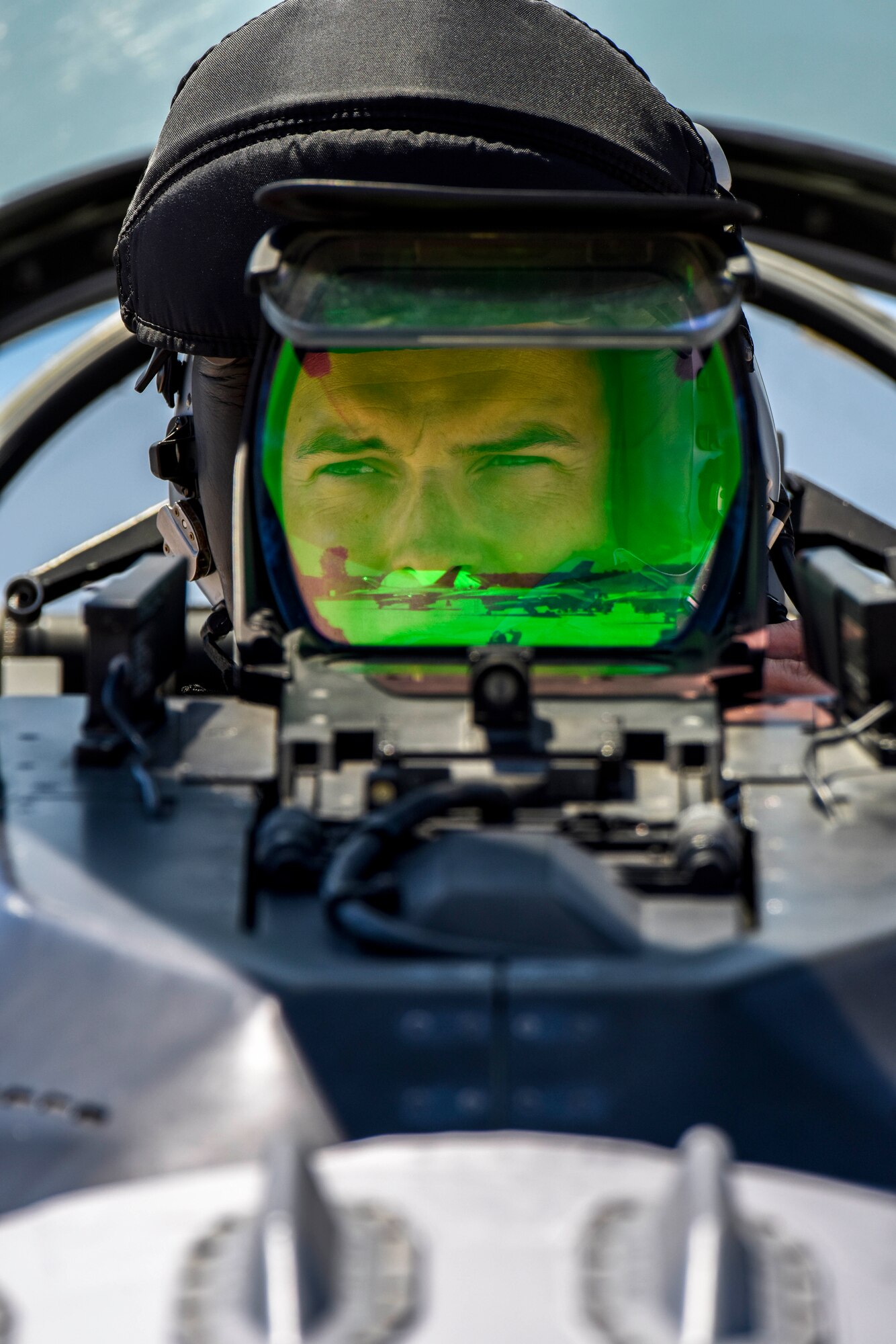 U.S. Air Force 1st Lt. T.J. Copic, an F-16 fighter pilot assigned to the Ohio National Guard’s 180th Fighter Wing, prepares for a training flight in an F-16 Fighting Falcon at the 180FW in Swanton, Ohio, June 30, 2020.