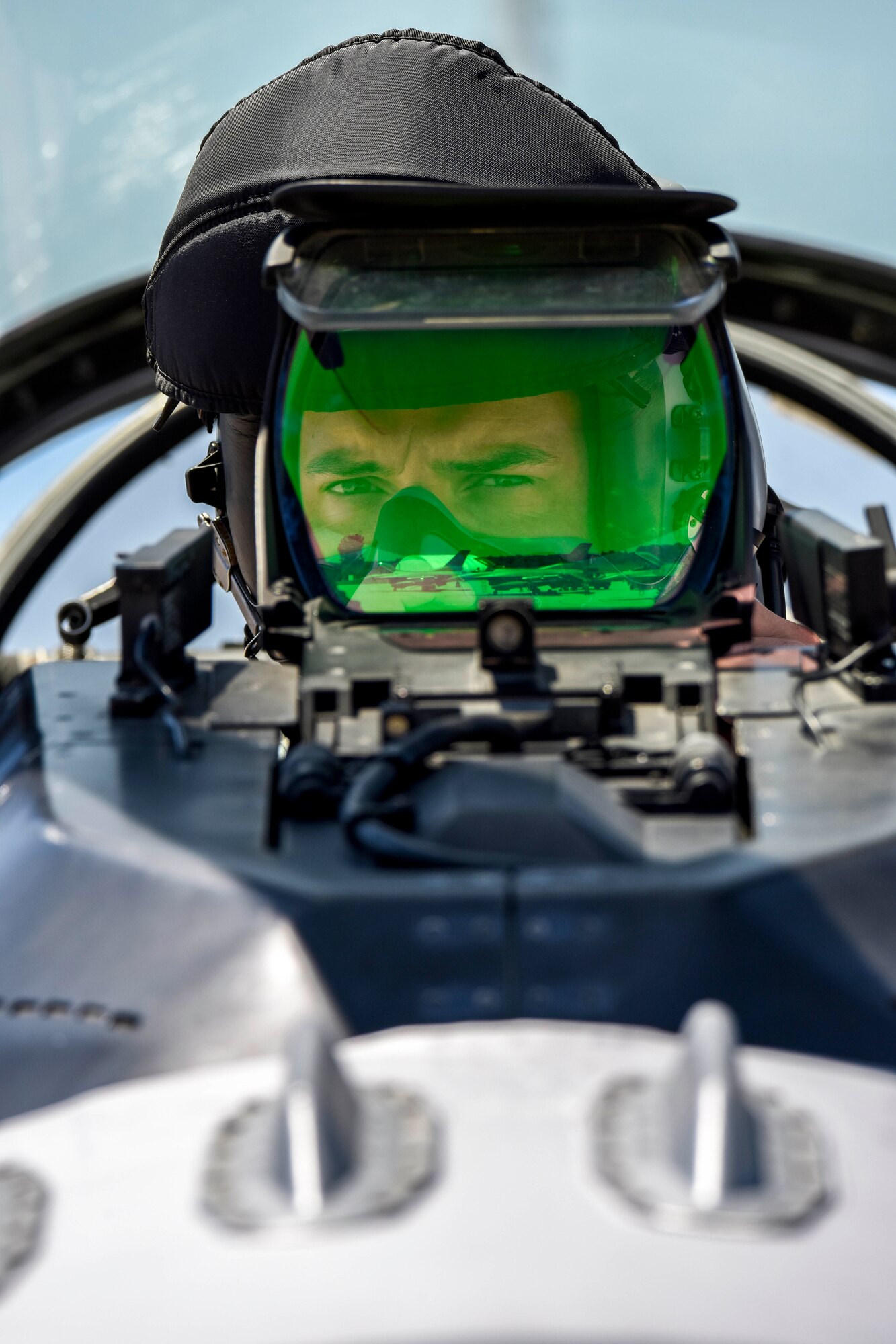 U.S. Air Force 1st Lt. T.J. Copic, an F-16 fighter pilot assigned to the Ohio National Guard’s 180th Fighter Wing, prepares for a training flight in an F-16 Fighting Falcon at the 180FW in Swanton, Ohio, June 30, 2020.