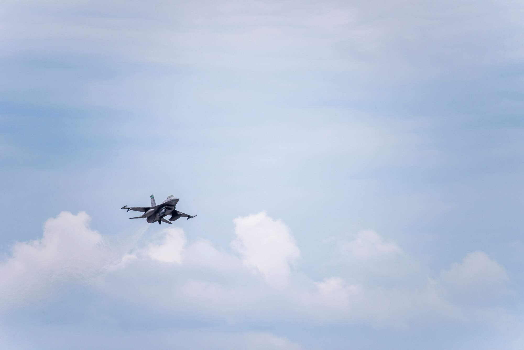 An F-16 Fighting Falcon, assigned to the Ohio National Guard’s 180th Fighter Wing, takes off during a training flight at the 180FW in Swanton, Ohio, July 30, 2020.