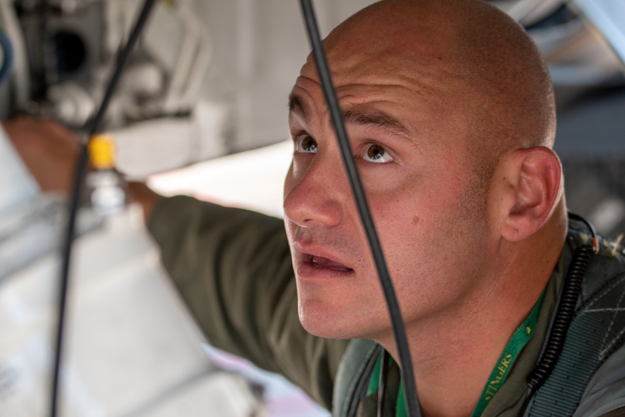 U.S. Air Force Capt. Joshua Caudill, an F-16 fighter pilot assigned to the Ohio National Guard's 180th Fighter Wing, conducts a pre-flight inspection of an F-16 fighter jet before a training flight at the 180FW, in Swanton, Ohio, Aug. 27, 2020.