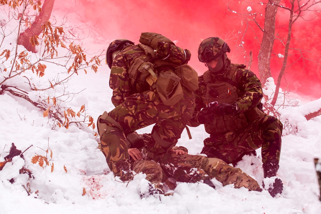 Troops operate in the snow.