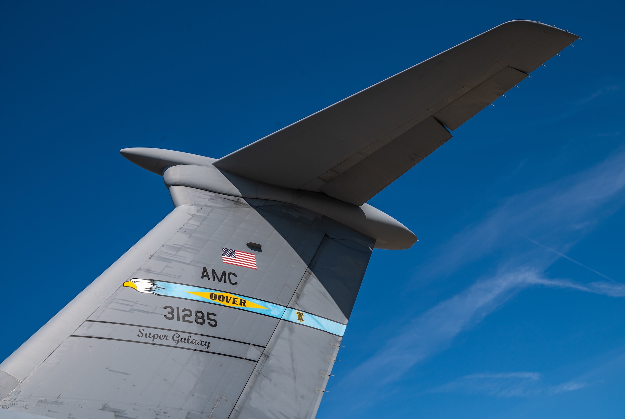 A C-5M Super Galaxy sits on the flight line prior to loadmaster training at Dover Air Force Base, Delaware, March 9, 2021. Loadmasters from the 9th Airlift Squadron participated in the training as part of a Major Command Service Tail Trainer initiative driven by Air Mobility Command. The training expedites C-5 loadmaster upgrade training, enabling Dover AFB to provide rapid global airlift. (U.S. Air Force photo by Senior Airman Christopher Quail)