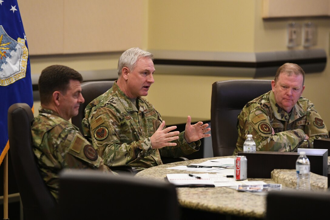 From left, Lt. Gen. Michael Loh, Air National Guard director, Lt. Gen. Timothy Fay, Air Force Director of Staff, and Lt. Gen. Richard Scobee, Air Force Reserve chief, discuss Total Force Integration goals during the virtual TFI Symposium at the Jacob Smart Conference Center on Joint Base Andrews, Md., March 23, 2021.