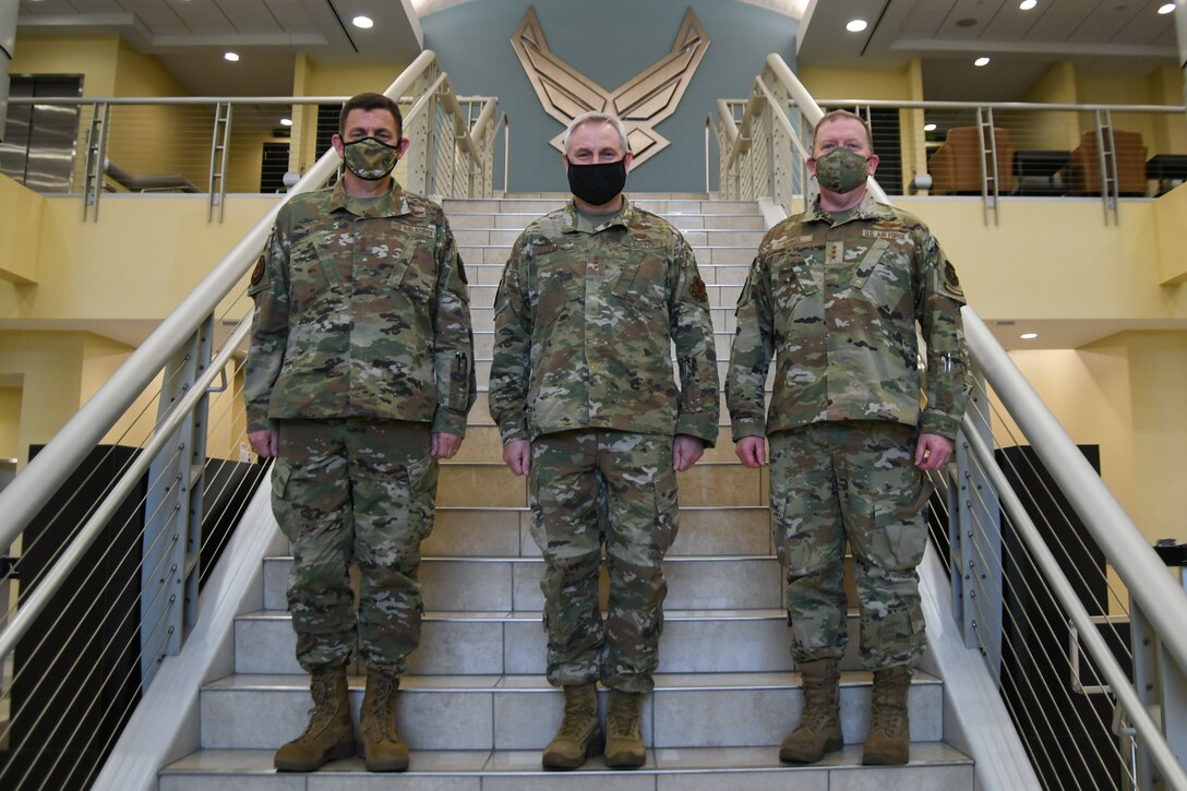 From left, Lt. Gen. Michael Loh, Air National Guard director, Lt. Gen. Timothy Fay, Air Force Director of Staff, and Lt. Gen. Richard Scobee, Air Force Reserve chief, pose for a photo at the Jacob Smart Conference Center on Joint Base Andrews, Md., March 23, 2021.