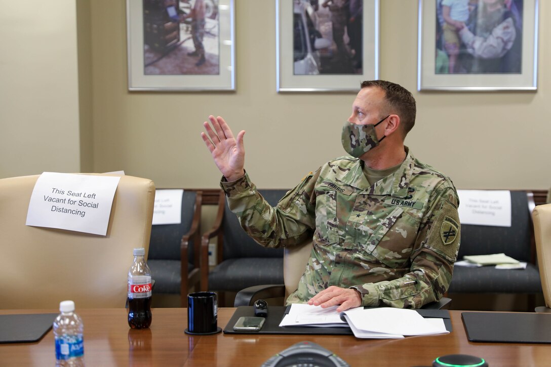 Commanding General of the 352nd Civil Affairs Command, Brig. Gen. Jeffrey M. Farris, conducts a portion of the the Fiscal Year 2022 Training Brief (YTB) to the Commanding General of the U.S. Army Civil Affairs and Psychological Operations Command (Airborne), Brig. Gen. Jeffrey C. Coggin, March 23 - 26 2021, Ft. Bragg, N.C. The FY22 YTB is an annual event hosted by USACAPOC(A) for commanders from subordinate elements to brief training concepts, philosophies and challenges during the socially distant, protective measured YTB at the USACAPOC(A) headquarters at Ft. Bragg, N.C.