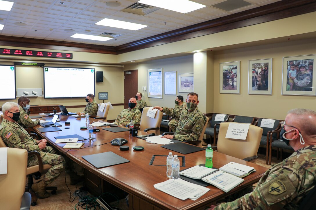 Commanding General of the U.S. Army Civil Affairs and Psychological Operations Command (Airborne), Brig. Gen. Jeffrey C. Coggin, receives a portion of the command’s Fiscal Year 2022 Training Brief (YTB) from command teams of USACAPOC(A) subordinate units, March 23 - 26 2021. The FY22 YTB is an annual event hosted by USACAPOC(A) for commanders to brief training concepts, philosophies and challenges during the socially distant, protective measured YTB at the USACAPOC(A) headquarters at Ft. Bragg, N.C.