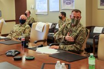 Commanding General of the 352nd Civil Affairs Command, Brig. Gen. Jeffrey M. Farris (right), with Command Sgt. Maj. Michael R. Mielke (left), senior enlisted advisor for the 352nd CACOM, conducts a portion of the Fiscal Year 2022 Training Brief (YTB) to the Commanding General of the U.S. Army Civil Affairs and Psychological Operations Command (Airborne), Brig. Gen. Jeffrey C. Coggin, March 23 - 26 2021, Ft. Bragg, N.C. The FY22 YTB is an annual event hosted by USACAPOC(A) for commanders from subordinate elements to brief training concepts, philosophies and challenges during the socially distant, protective measured YTB at the USACAPOC(A) headquarters at Ft. Bragg, N.C.