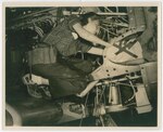 A flight test mechanic works on a plane in 1942-1943 at Duncan Field, later renamed Kelly Field, Texas. Women who worked at Kelly Field were known locally as “Kelly Katies.” (Courtesy photo provided by the National WASP World War II Museum)