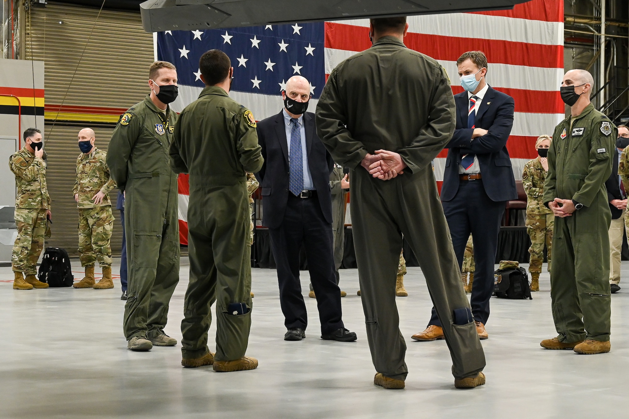 cting Secretary of the Air Force John Roth (left center) and U.S. Rep. Blake Moore (right center), R-Utah, are briefed by 388th Fighter Wing and Reserve 419th Fighter Wing leadership.