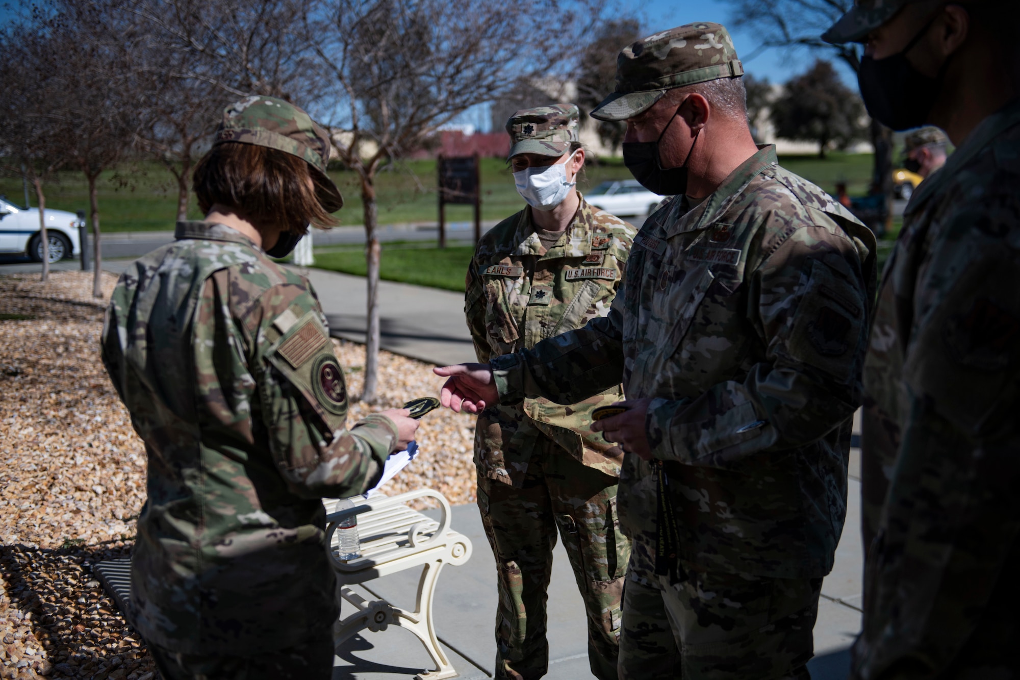 Chief Master Sgt. of the Air Force JoAnne Bass, left, receives a 9th Physiological Support Squadron (PSPTS) patch from 9th PSPTS leadership on Beale Air Force Base.