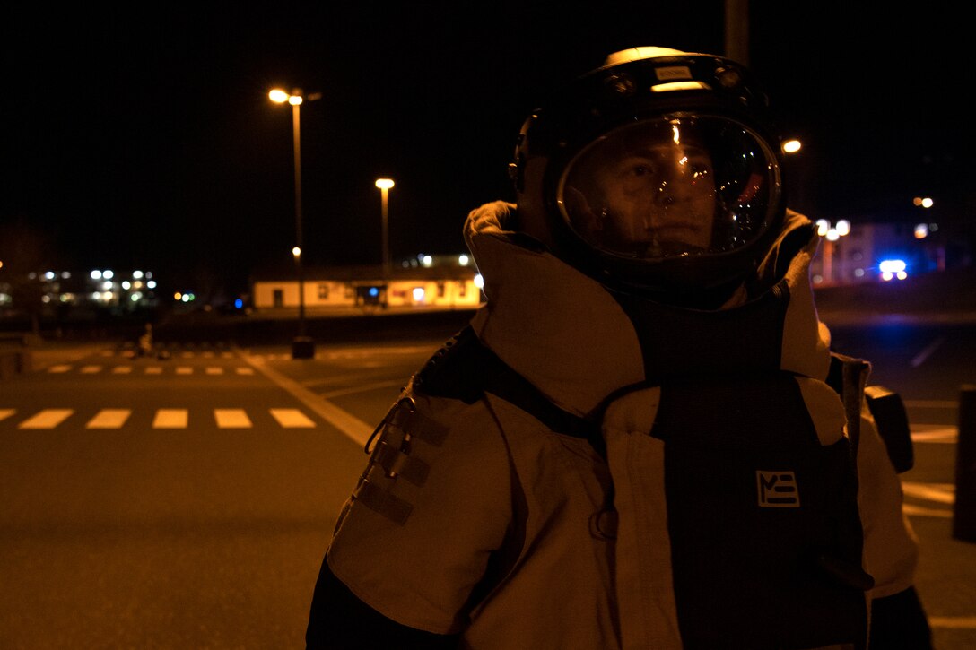 U.S. Air Force Staff Sgt. Timothy Danforth, 52nd Civil Engineer Squadron Explosive Ordnance Disposal technician, walks back to his teammates after taking X-rays of a suspicious package during Exercise AGILE SABRE on Spangdahlem Air Base, Germany, March 25, 2021.