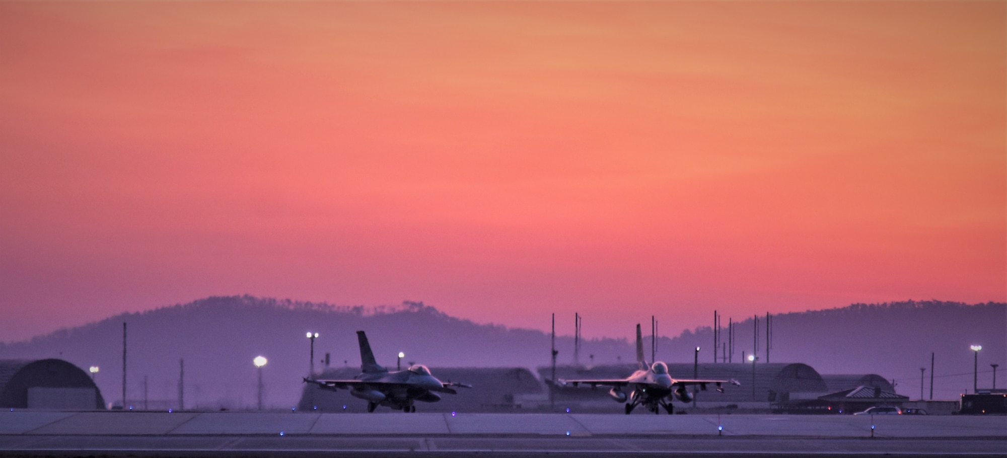 F-16 Fighting Falcons from the 8th Fighter Wing, taxi before take-off during a training event at Kunsan Air Base, Republic of Korea, March 24, 2021. The F-16 Fighting Falcon is a compact, multi-role fighter aircraft that is highly maneuverable in air-to-air combat and air-to-surface attack. It can reach top speeds of 1,500 mph and can reach altitudes of more than 50,000 feet. (U.S. Air Force photo by Tech. Sgt. Kristin S. High)