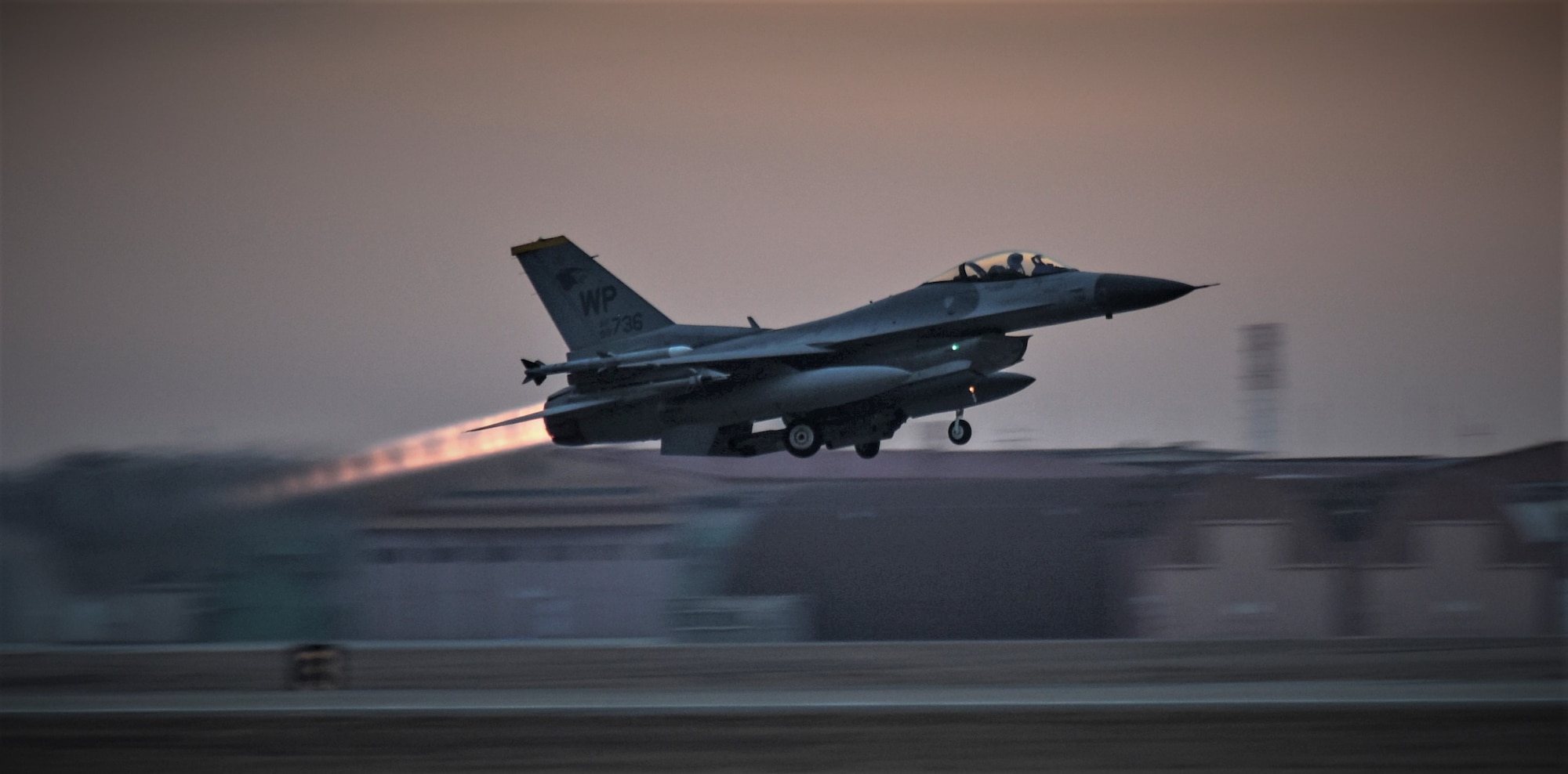 An 8th Fighter Wing F-16 Fighting Falcon takes off during a routine training event at Kunsan Air Base, Republic of Korea, March 24, 2021. The F-16 Fighting Falcon is a compact, multi-role fighter aircraft that is highly maneuverable in air-to-air combat and air-to-surface attack. It can reach top speeds of 1,500 mph and can reach altitudes of more than 50,000 feet. (U.S. Air Force photo by Tech. Sgt. Kristin S. High)