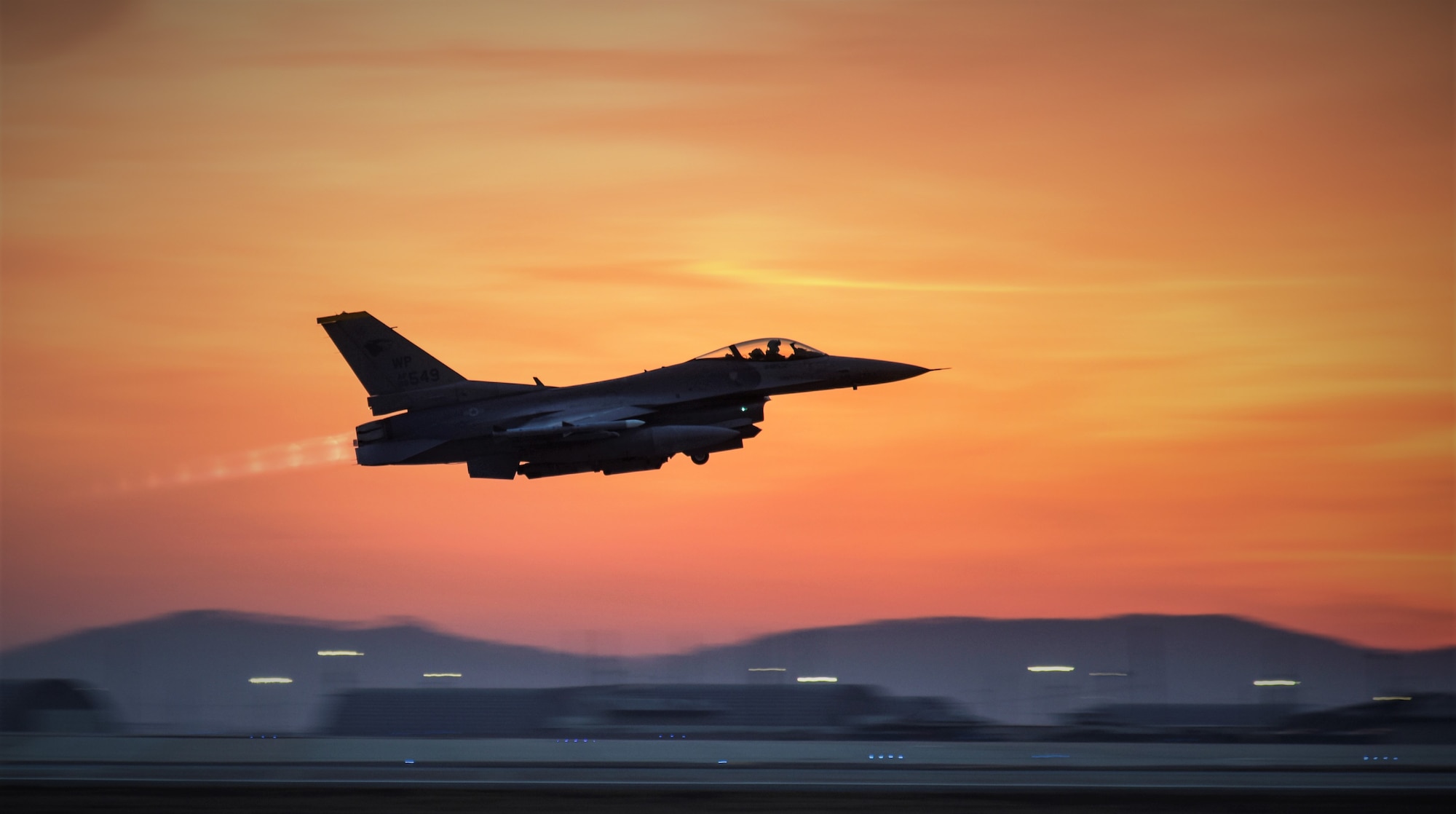 An 8th Fighter Wing F-16 Fighting Falcon takes off during a routine training event at Kunsan Air Base, Republic of Korea, March 24, 2021. The F-16 Fighting Falcon is a compact, multi-role fighter aircraft that is highly maneuverable in air-to-air combat and air-to-surface attack. It can reach top speeds of 1,500 mph and can reach altitudes of more than 50,000 feet. (U.S. Air Force photo by Tech. Sgt. Kristin S. High)