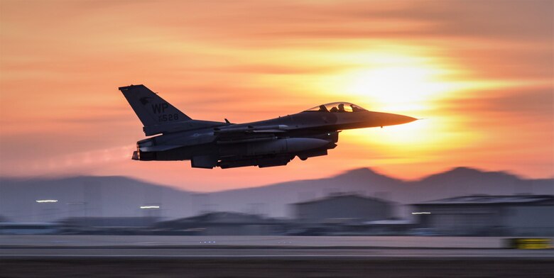 An 8th Fighter Wing F-16 Fighting Falcon takes off during a routine training event at Kunsan Air Base, Republic of Korea, March 24, 2021. The F-16 Fighting Falcon is a compact, multi-role fighter aircraft that is highly maneuverable in air-to-air combat and air-to-surface attack. It can reach top speeds of 1,500 mph and can reach altitudes of more than 50,000 feet. (U.S. Air Force photo by Tech. Sgt. Kristin S. High)