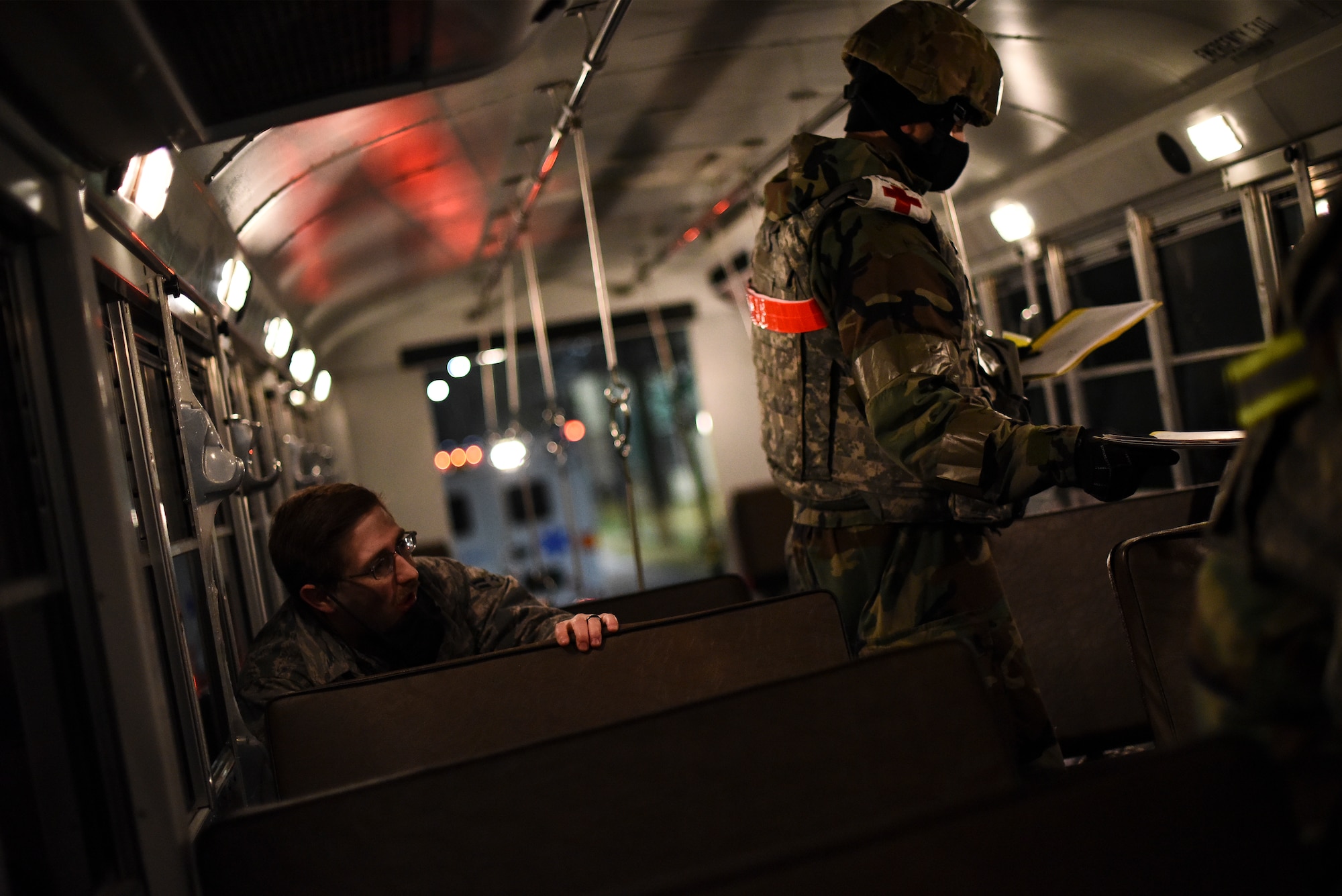 A simulated victim waits to be briefed.