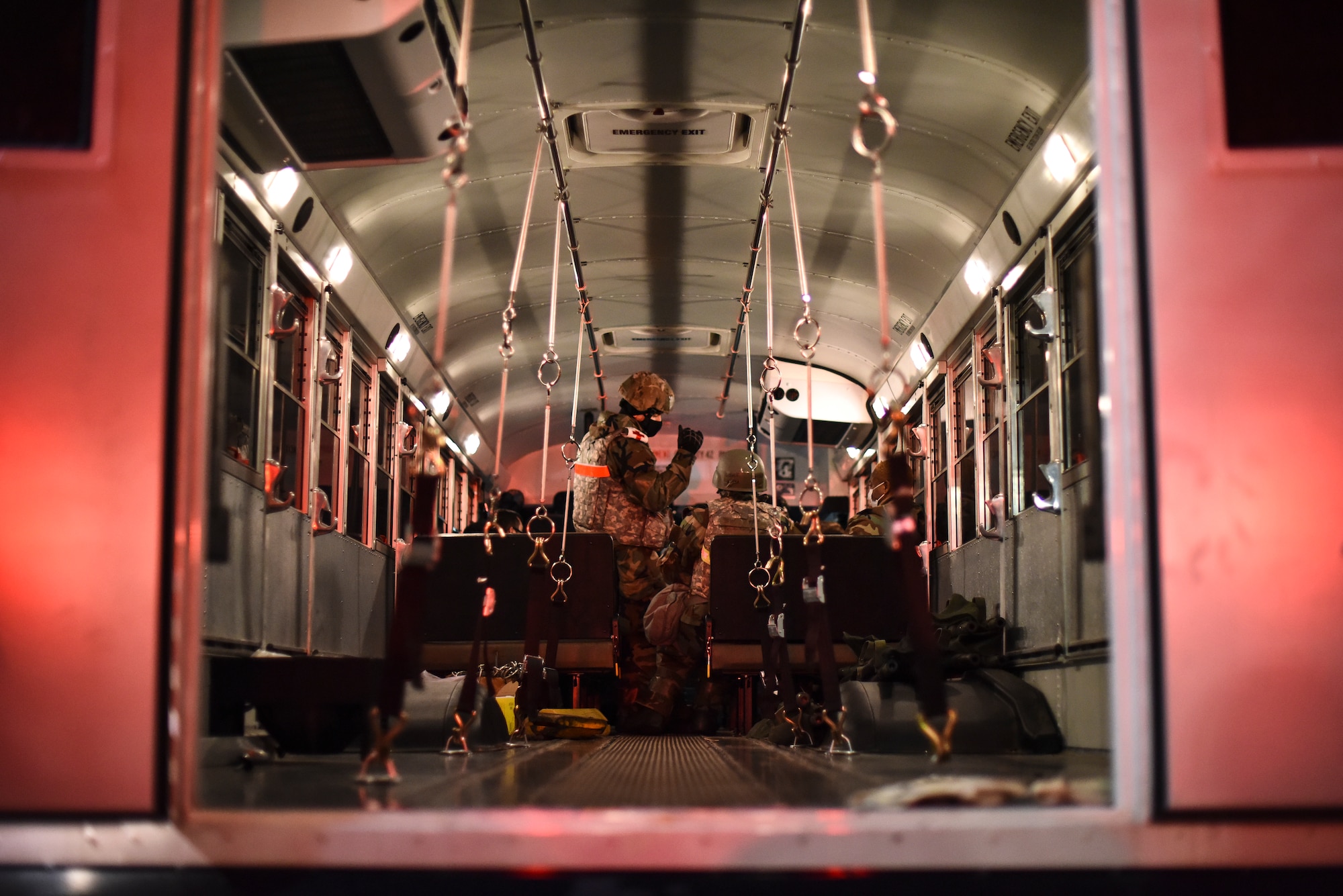 An Airman briefs simulated victims.