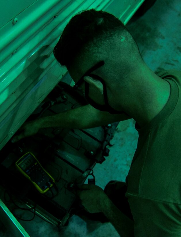 Staff Sgt. Ricky Dupris, 8th Logistics Readiness Squadron vehicle maintenance shop supervisor, uses a multimeter to check various issues on a bus at Kunsan Air Base, Republic of Korea, March 23, 2021.  The 8th LRS vehicle maintenance flight maintains and repairs a fleet of more than 500 vehicles, ensuring the Wolf Pack can stay on the move. (U.S. Air Force photo by Tech. Sgt. Kristin S. High)