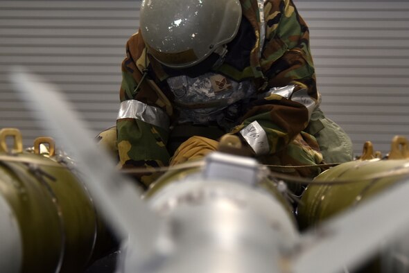 Staff Sgt. Chase Wood, 8th Maintenance Squadron munitions inspector, secures munitions to a trailer during a routine training event at Kunsan Air Base, Republic of Korea, March 24, 2021. The 8th MXS “Dragons” build and maintain munitions for the 8th Fighter Wing. (U.S. Air Force photo by Senior Airman Suzie Plotnikov)