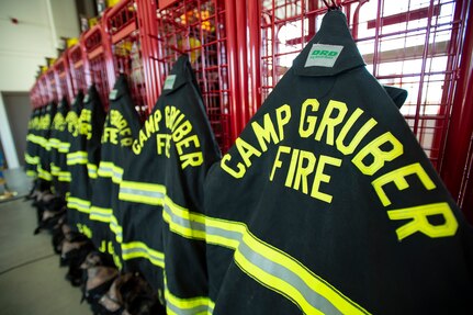 Fire fighting gear is staged for easy access inside the newly opened Fire Station Number 1 at Camp Gruber, Oklahoma, March 24, 2021. (Oklahoma National Guard photo by Anthony Jones)
