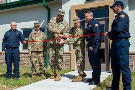 Maj. Gen. Michael Thompson, adjutant general for Oklahoma, and Col. Brad Carter, commander of Camp Gruber Training Center cut the ceremonial ribbon officially opening Fire Station Number 1 on Camp Gruber, Oklahoma, March 24, 2021. (Oklahoma National Guard photo by Anthony Jones)