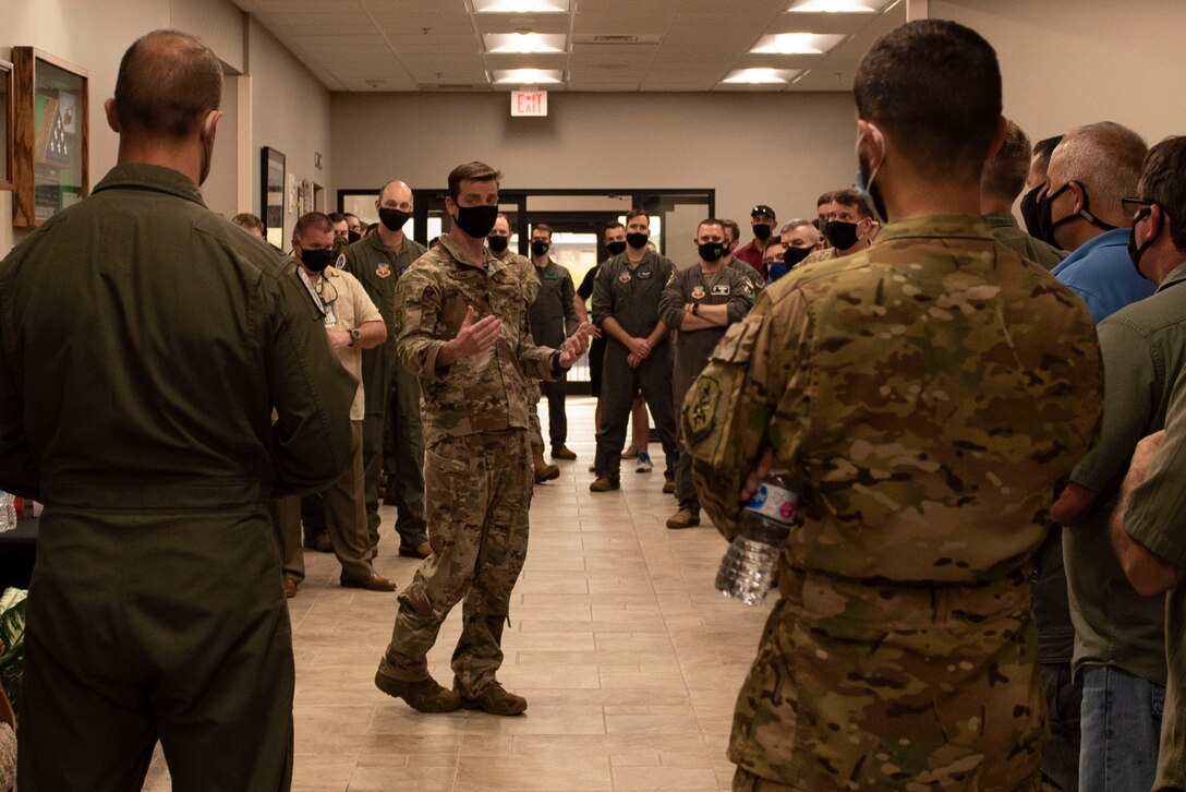 A photo of a U.S. Air Force commander making closing remarks at a ceremony.