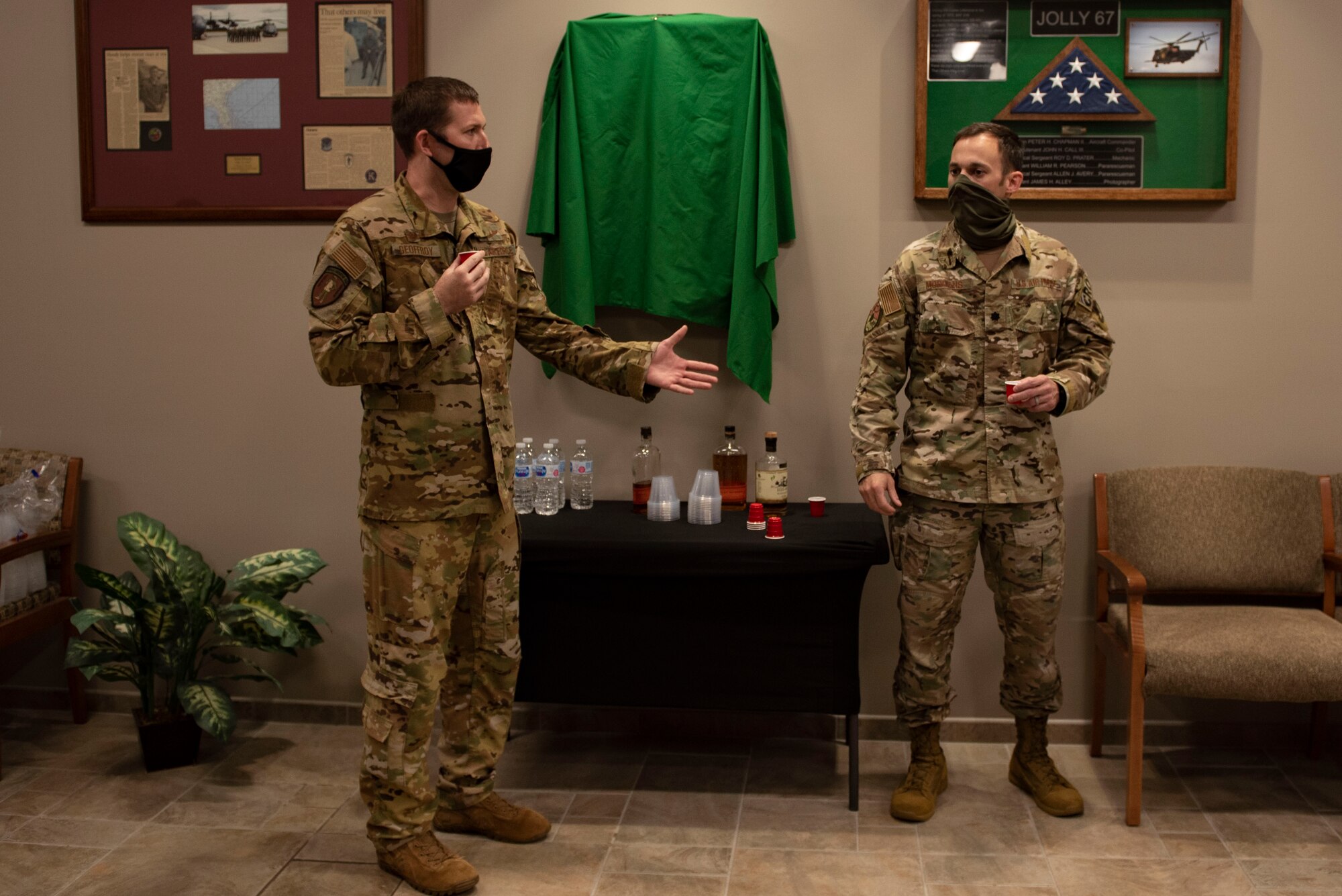 A photo of two U.S. Air Force commanders preparing a toast.