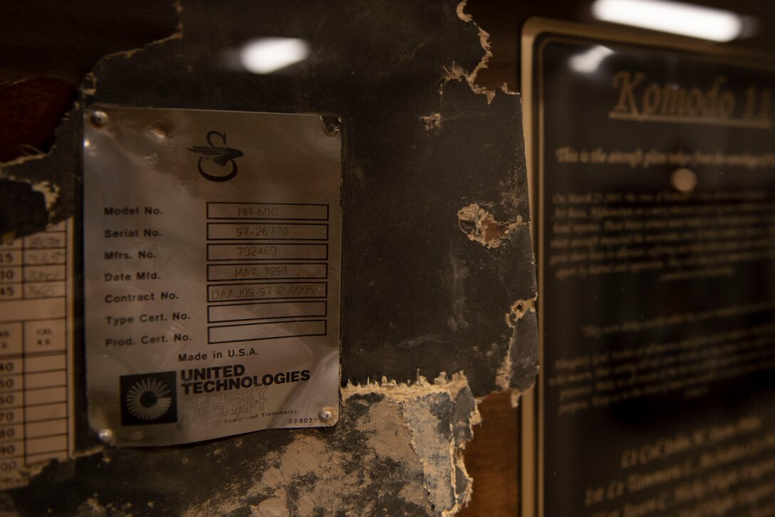 A photo of a shadowbox on a wall.