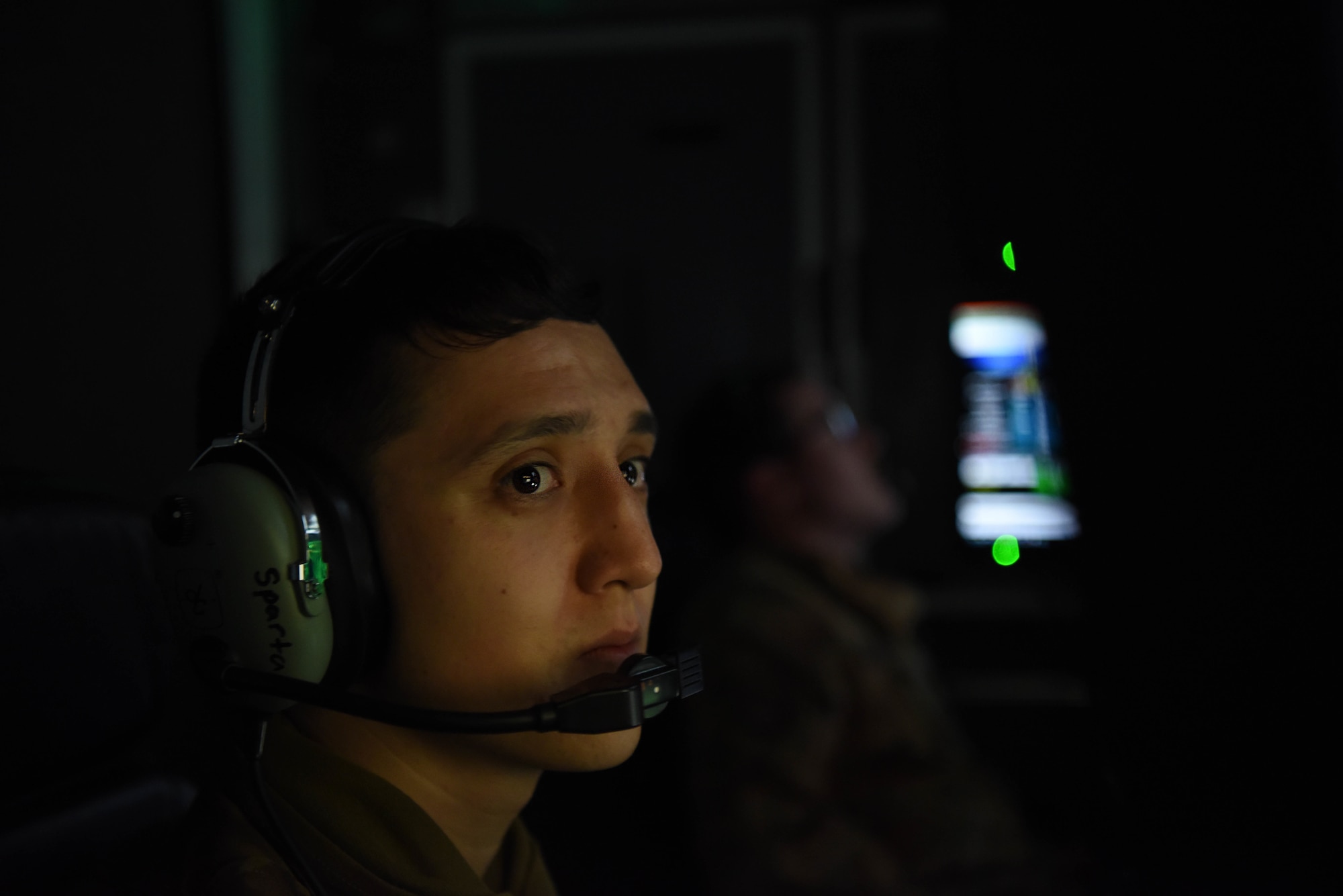 A U.S. Air Force remotely piloted aircraft sensor operator assigned to the 12th Expeditionary Special Operations Squadron monitors a screen at Chabelley Airfield, Djibouti, March 19, 2021. Providing our forces with the intelligence needed, sensor operators play an integral role in helping forces know what actions to take during each sortie. (U.S. Air Force photo by Staff Sgt. Matthew J. Wisher)