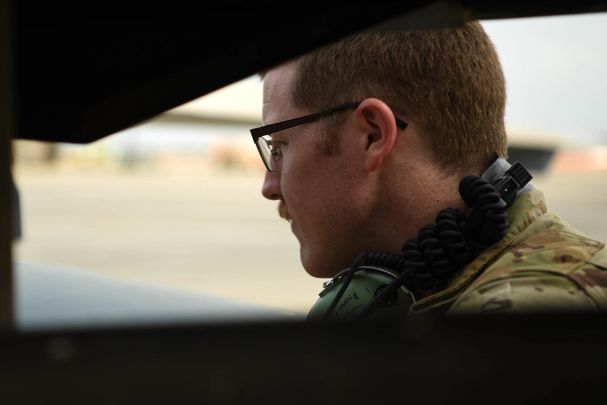 A U.S. Air Force remotely piloted aircraft pilot assigned to the 12th Expeditionary Special Operations Squadron inspects the sensor on a MQ-9 remotely piloted aircraft at Chabelley Airfield, Mar. 19, 2021.      RPA’s enable nonstop surveillance on their area of responsibility, delivering crucial information on enemy movement. (U.S. Air Force photo by Staff. Sgt. Matthew J. Wisher)