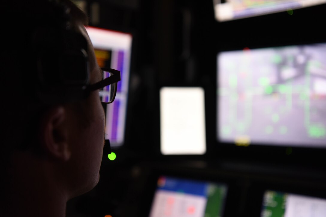 A U.S. Air Force remotely piloted aircraft pilot assigned to the 12th Expeditionary Special Operations Squadron checks the view on a MQ-9 sensor before takeoff at Chabelley Airfield, March 19, 2021. RPA pilots provide close air support, intelligence gathering and can conduct strategic airstrikes for mission partners at a moment’s notice. (U.S. Air Force photo by Staff Sgt. Matthew J. Wisher)
