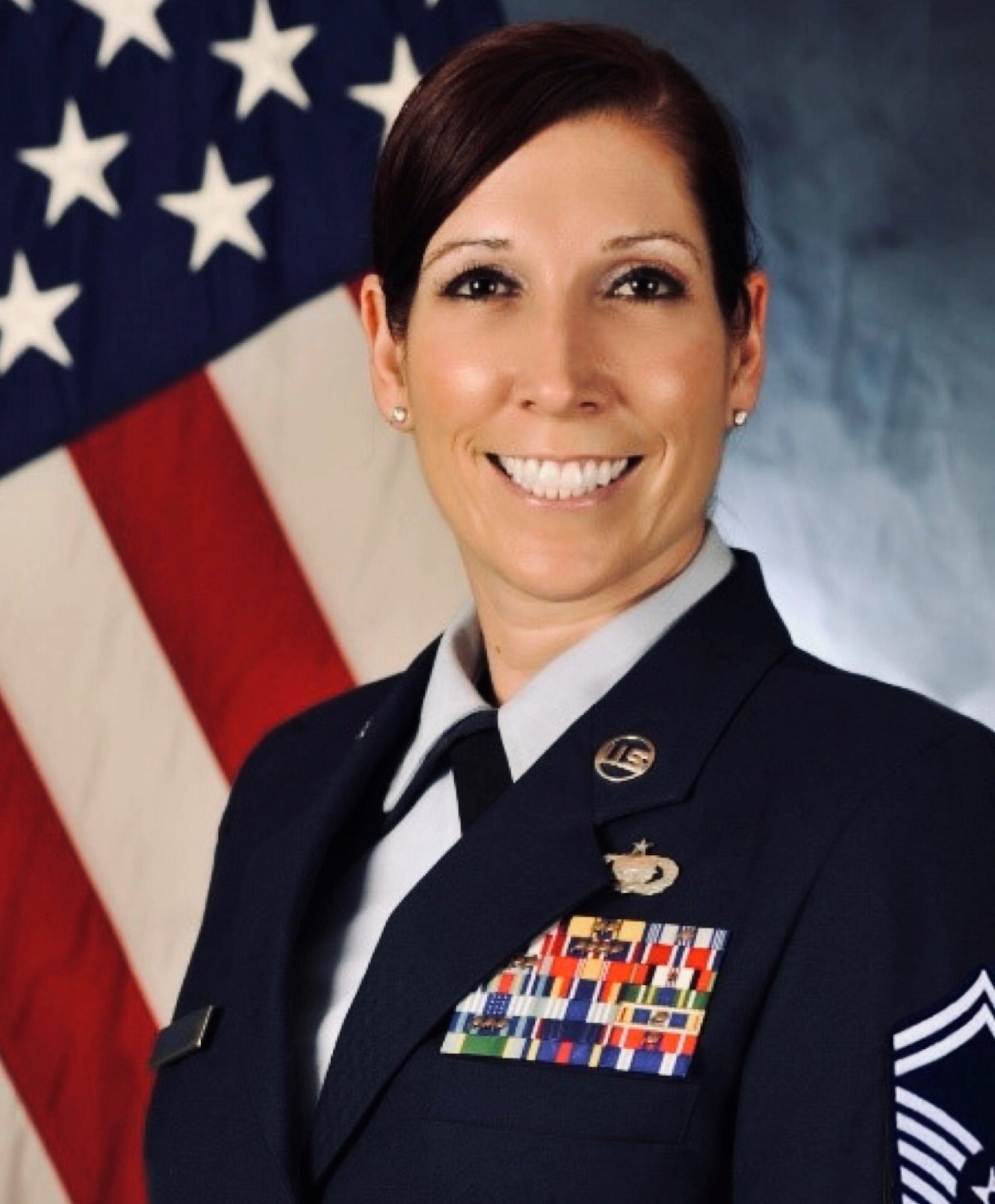 U.S. Air Force Senior Master Sgt. Tracy Bennett, 435th Air Expeditionary Wing senior enlisted leader and superintendent of expeditionary manpower and organization, poses in an official photo, Ramstein Air Base, Germany, March 23, 2021. Bennett’s duties include evaluating expeditionary organization structures for effectiveness and efficiency by studying the organization’s mission, structure and workload. As a senior enlisted leader, Bennett is the liaison between the enlisted force and the director of staff. Her goals are to finish her Masters of Business Administration, retire from the Air Force and travel the world. (Courtesy Photo)