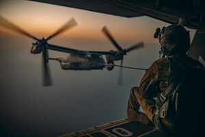 MC-130H provides fuel to MV-22s