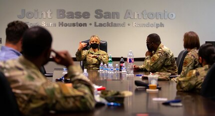 Brig. Gen. Caroline M. Miller, 502d Air Base Wing and Joint Base San Antonio commander, and Command Chief Master Sgt. Wendell Snider participate in the "Tough Conversations" roundtable topic of women in the Air Force. The “Tough Conversation” Roundtable is a monthly series focused on important, challenging and impactful topics that affect the Air Force and Department of Defense.
