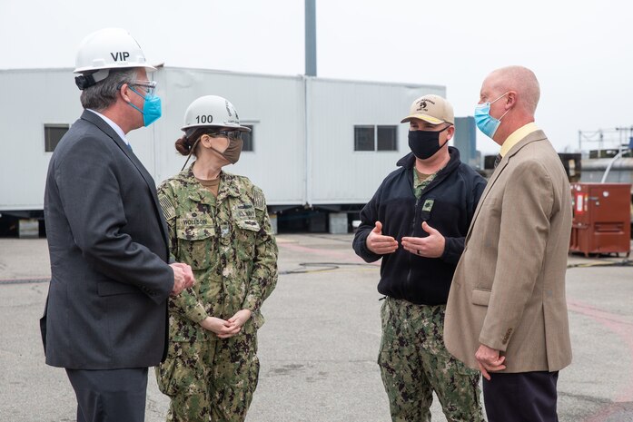 Acting Secretary of the Navy Thomas W. Harker stops at Dry Dock 4 during his visit to Norfolk Naval Shipyard March 17. Dry Dock 4 is undergoing a $200 million renovation spanning nearly three years as part of the Shipyard Infrastructure Optimization Program (SIOP) modernizing the nation’s public shipyards. Secretary Harker toured NNSY as part of a visit to the Mid-Atlantic region.