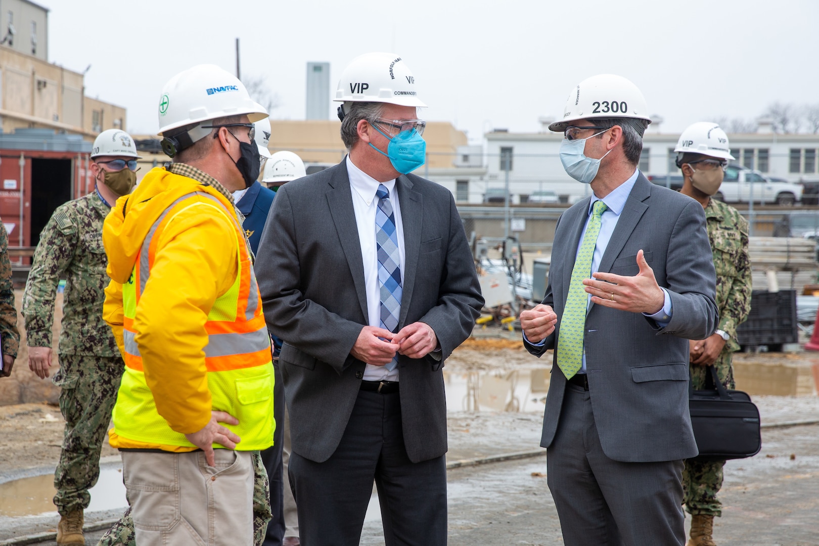 Acting Secretary of the Navy Thomas W. Harker speaks with Nuclear Engineering and Planning Manager Jeremy Largey during his visit to Norfolk Naval Shipyard March 17. Secretary Harker toured NNSY as part of a visit to the Mid-Atlantic region.