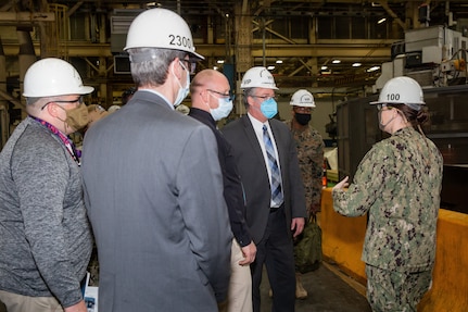 Acting Secretary of the Navy Thomas W. Harker visits the Production Machine Shop during his tour of Norfolk Naval Shipyard March 17. Secretary Harker toured NNSY as part of a visit to the Mid-Atlantic region.