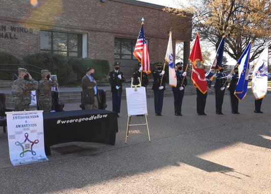 The Goodfellow Joint Service Color Guard present the colors during the singing of the national anthem at the proclamation signing ceremony for the 2021 Month of Awesomeness and Awareness, outside of the Western Winds Dining Facility, on Goodfellow Air Force Base, Texas, March 25, 2021.  The month of April recognizes military children, child abuse prevention, sexual assault prevention and response, alcohol abuse prevention and national financial capability. (U.S. Air Force photo by Senior Airman Abbey Rieves)