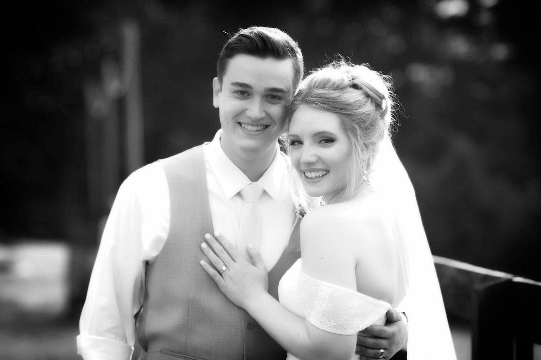 David (left) and Brianna (right) pose for a photo at their wedding. (U.S. Marine Corps courtesy photo)