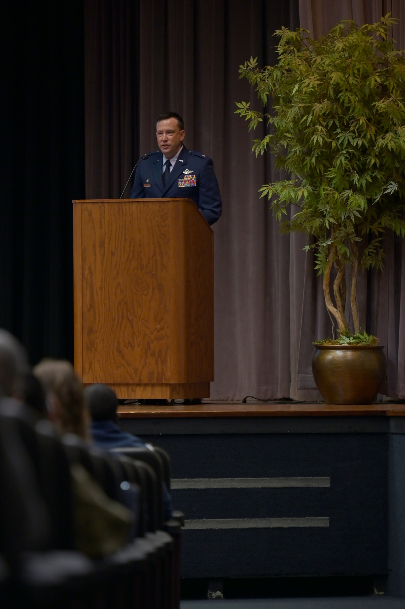 Col. Jeffrey Welborn, 14th Mission Support Group commander, speaks to the graduating class 21-07 at their graduation ceremony, March 26, 2021, on Columbus Air Force Base, Miss. Welborn assists and provides military advice to the 14th Flying Training Wing commander on the development and implementation of goals, plans, policies and procedures to accomplish all wing support activities. (U.S. Air Force photo by Senior Airman Jake Jacobsen)