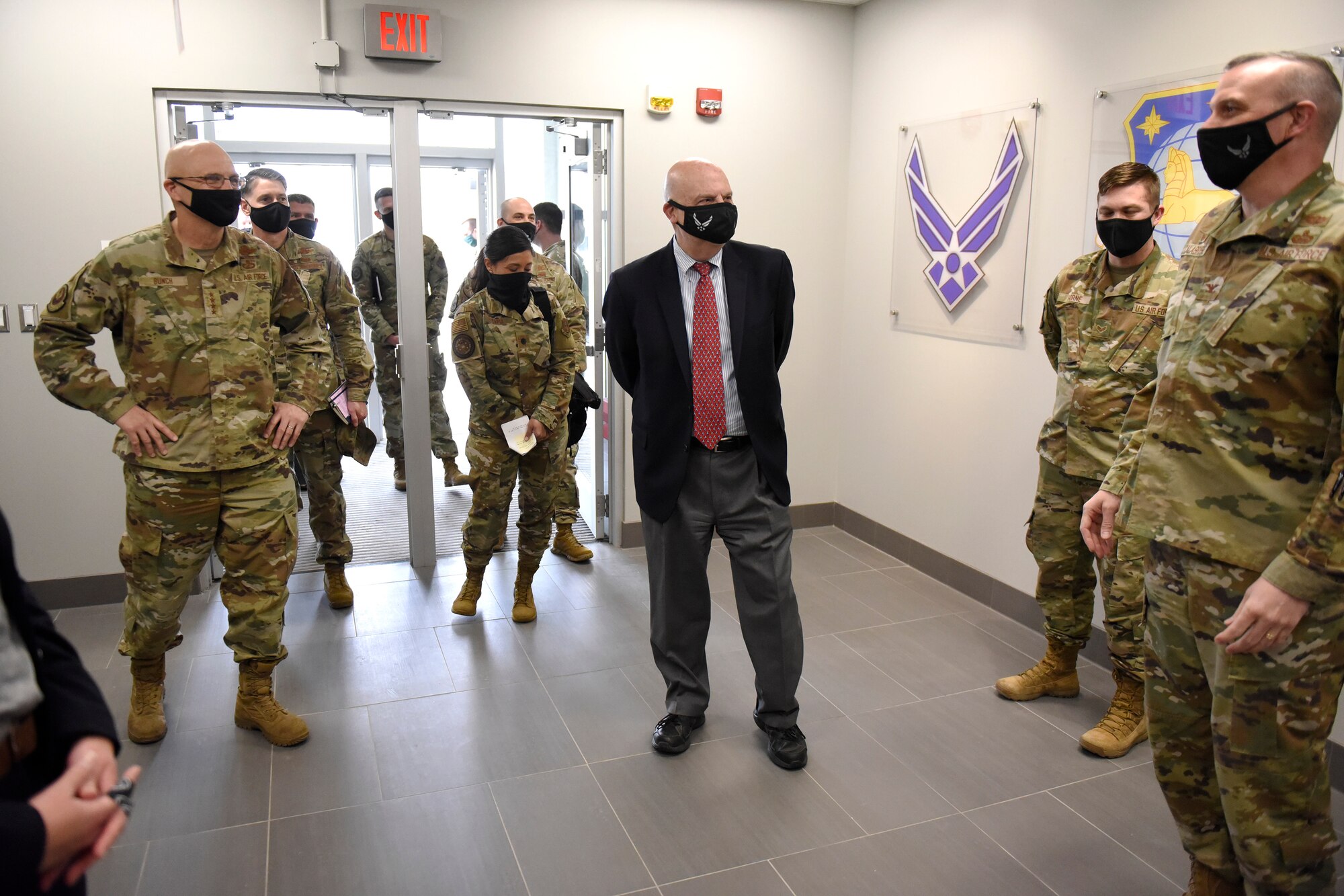Acting Secretary of the Air Force John Roth greets Air Force personnel with the National Air and Space Intelligence Center at Wright-Patterson Air Force Base, Ohio, March 23, 2021.  Roth met with Air Force personnel and toured several facilities at the base including the U.S. Air Force School of Aerospace Medicine Epidemiology Laboratory, which is responsible for analyzing a majority of the COVID-19 tests in the Air Force. (U.S. Air Force photo by Ty Greenlees)
