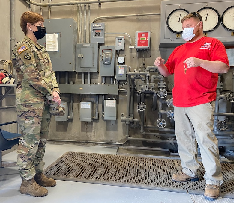 William Kramer, dam operator, briefs Col. Julie Balten, U.S. Army Corps of Engineers Los Angeles District commander, at Painted Rock Dam March 24 near Gila Bend, Arizona. Painted Rock Dam is a major flood control project in the Gila River Drainage Basin, constructed and operated by the Corps’ LA District.