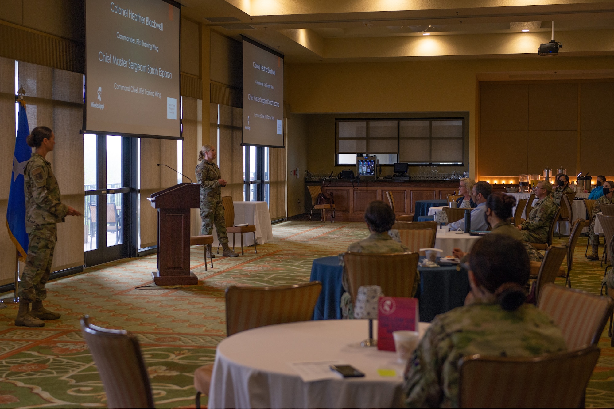 U.S. Air Force Chief Master Sgt. Sarah Esparza, 81st Training Wing command chief, speaks to attendees during the Military Women's Summit in the Bay Breeze Event Center at Keesler Air Force Base Mississippi, March 26, 2021. The summit focused on owning leadership catered to veterans, retirees, reservists, active duty and national guard members. (U.S. Air Force photo by Senior Airman Kimberly L. Mueller)