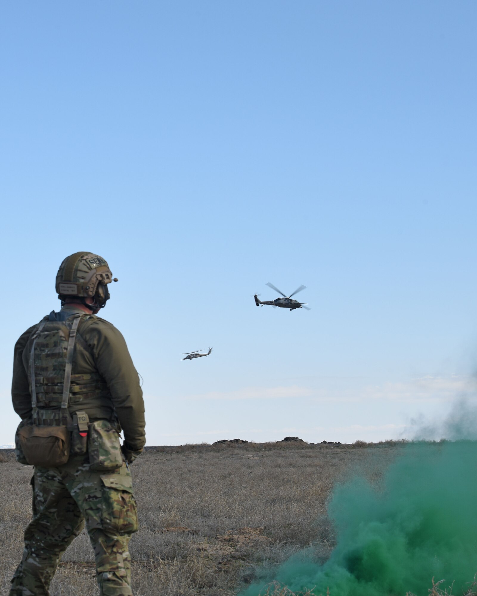 A man drops a smoke gernade